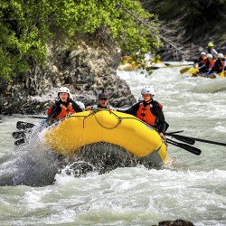 guests rafting kicking horse river on full day heli trip