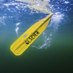 glacier raft company paddle blade under the water of kicking horse river