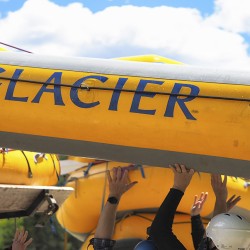 guests loading glacier raft company boat after rafting the kicking horse