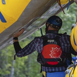 guide loading raft after rafting kicking horse river