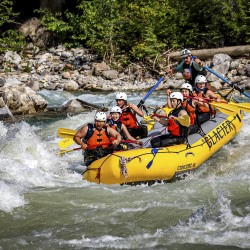 raft going into a big rapid on the kicking horse river