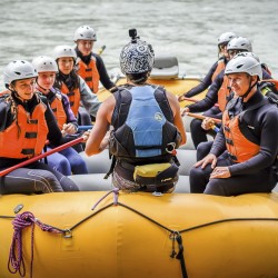 guide give safety talk in raft before rafting in golden bc