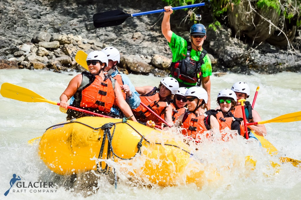 A crew of friends rafting on the Kicking Horse