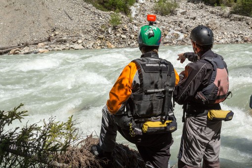 Two guides scouting the White River in British Columbia