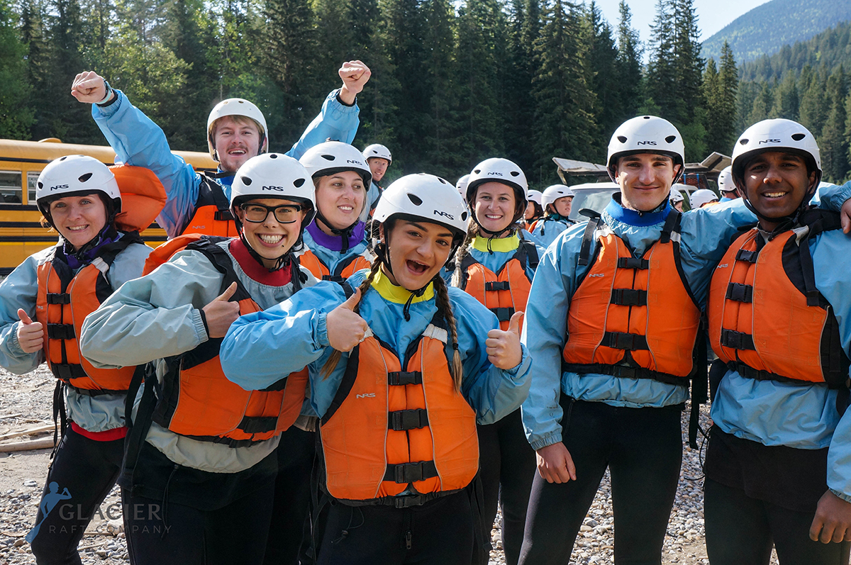 Group of friends happy to be white water rafting the Kicking Horse River