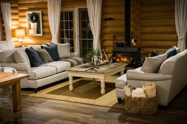 Relax by the fireplace at Whitewater Lodge B&B