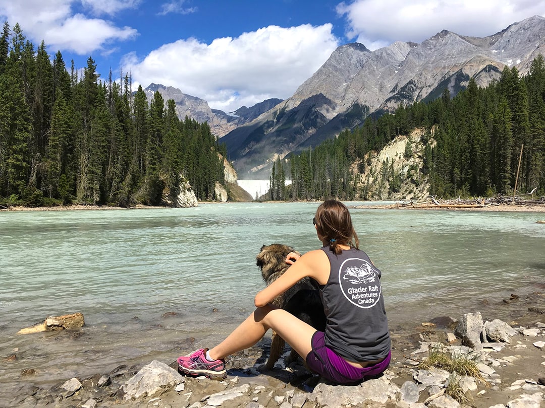 girl and dog at south access to wapta falls in yoho national park