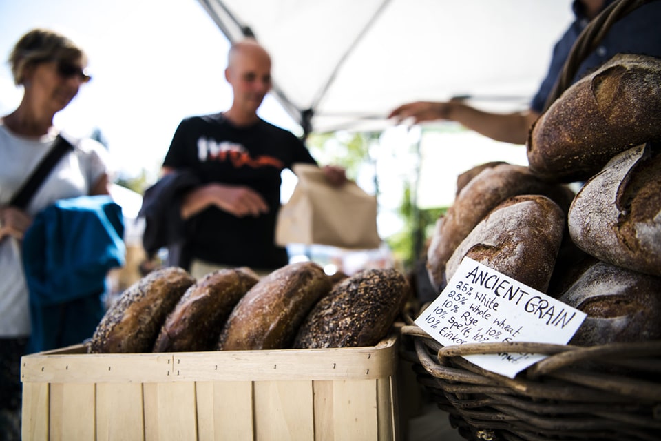 People shopping at Farmers' Market is a great way to support local vendors and help your community