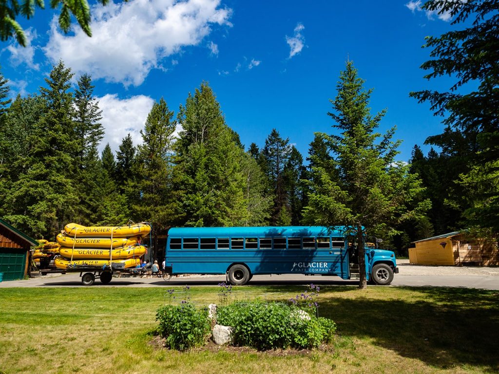 A bus and rafts and the Glacier Raft Company base in Golden BC