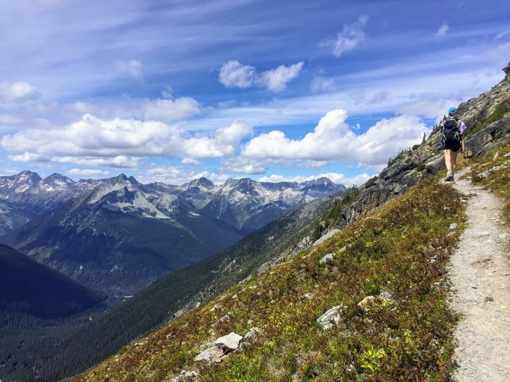 Girl hiking in the alpine in Glacier National Park, BC