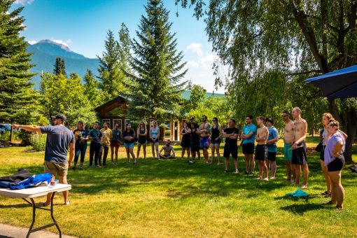 Safety briefing with guests at Glacier Raft Company base before rafting the Kicking Horse River